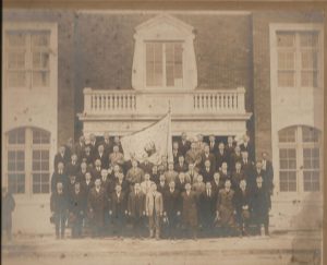 West Side Dom Polski exterior featuring members of a men’s Polish organization (ca. 1930).