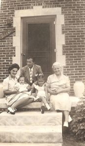 On the porch of 8110 Strathmoor, Detroit. Left to right: Leona Cipkowski, Ted Gomulka, Anna Gomulka, Carol Cipkowski, and Nancy Martin (ca. 1942)