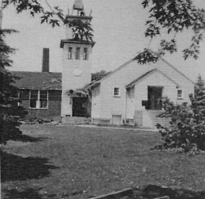 The old, original Ss. Peter & Paul church, which was to be razed to make way for the new church, June 4, 1957 (SS. PETER AND PAUL PARISH 1923 – 2003 100 YEAR ANNIVERSARY Parish Bulletin, courtesy of Lorin Wojczynski and the Wojczynski family)