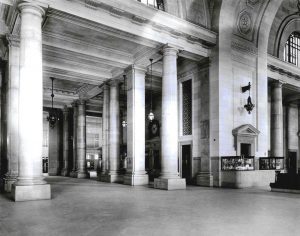 Michigan Central Station main floor waiting area showing large marble columns, 1916