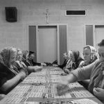 A timeless photo of Polish American women playing bingo at an unknown location.