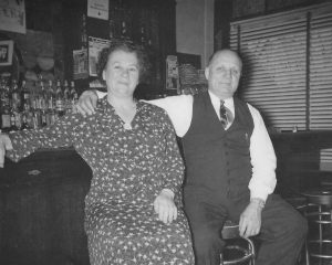 John and Kathryn strike a relaxed pose at the bar, ca. 1939.