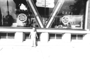 Toddler Loretta Zaydel on the Central side of Michno’s Café, ca. 1940.