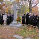 A large group of Felician Sisters, including Sisters from Vietnam, Haiti, and Poland (via Rome, Italy), gather at the Felician Sisters’ monument in Holy Sepulchre Cemetery, marking the spot where 495 Felician nuns have been buried since 1924