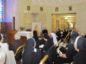Pilgrims gather in the Holy Sepulchre Cemetery Rotunda Chapel Main Mausoleum