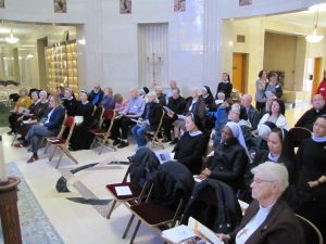 Pilgrims gather in the Holy Sepulchre Cemetery Rotunda Chapel Main Mausoleum