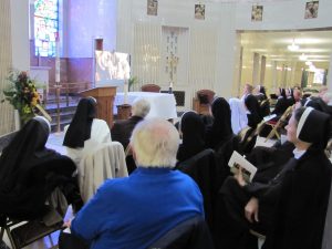 The pilgrims are riveted on the screen as Sr. M. Andrew Budinski, CSSF, narrates the film documenting the history of the Felician Sisters and their pioneers