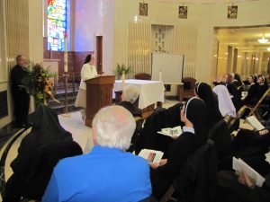 During the Wypominki, Sr. Joyce Marie Van de Vyver, CSSF, Local Minister of the Felician Sisters at the Presentation of the Blessed Virgin Mary Convent in Livonia, collectively remembers all 495 Felician Sisters who have been buried in Holy Sepulchre Cemetery since 1924